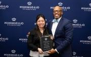 2023 Customer Relations Employee of the Year Linh Nguyen with President Brian O. Hemphill.